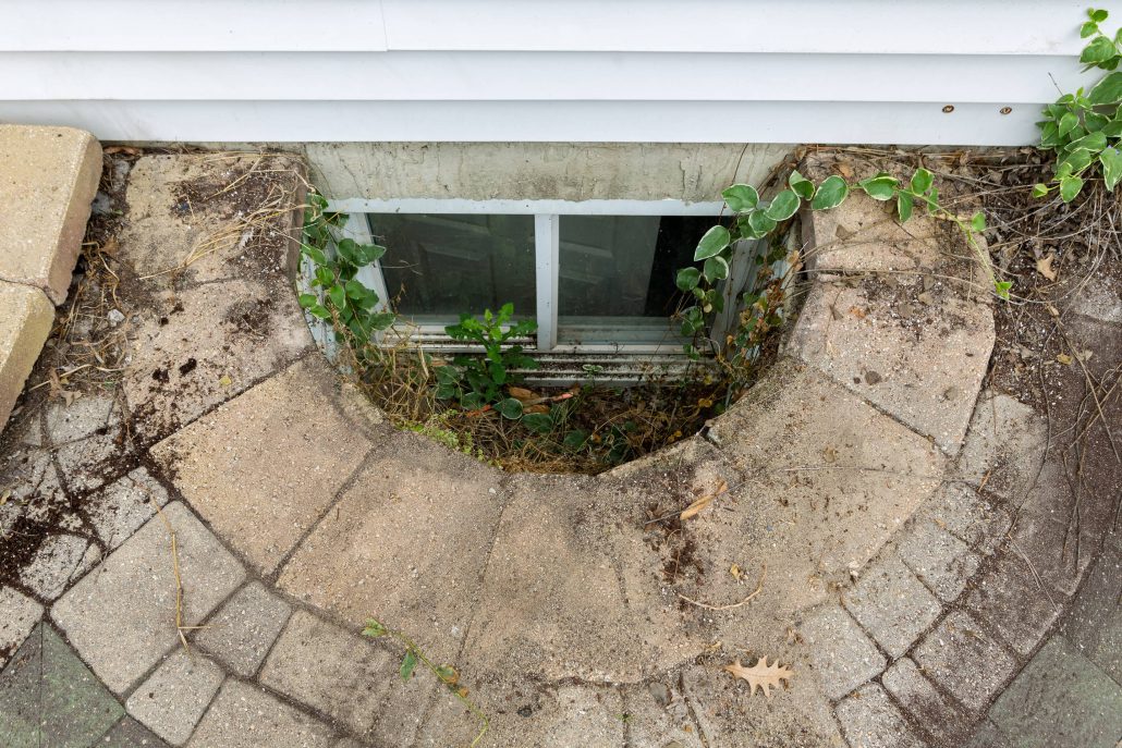 Basement sliding egress window