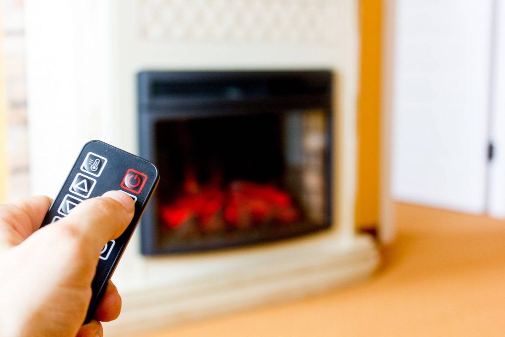 An electric fireplace works with remote